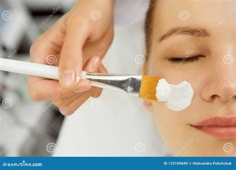 attractive young woman  facial mask   spa stock image