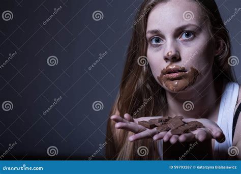 Skinny Girl Refusing To Eat Sweets Stock Image