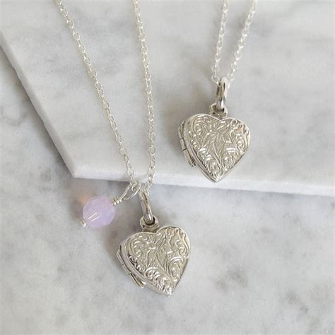 sterling silver etched heart locket  mia belle notonthehighstreetcom