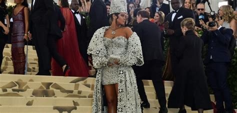 rihanna wears “pope” outfit and steals the show at met gala video