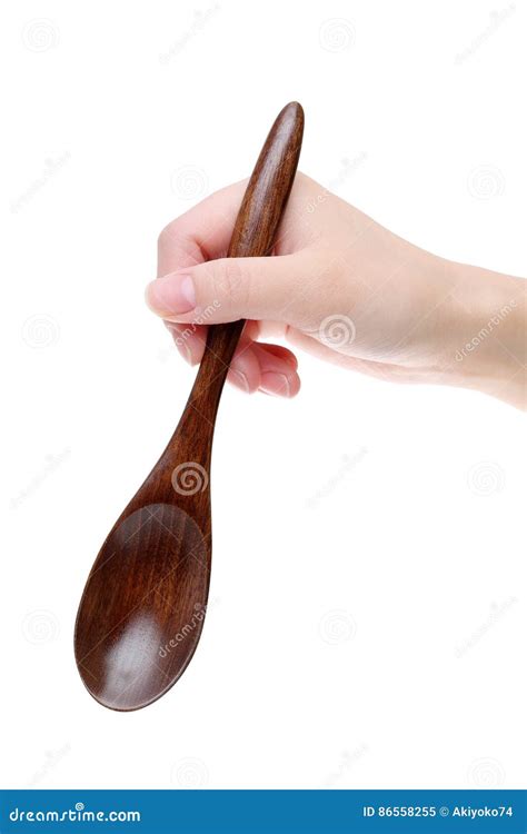 hand holding wooden spoon stock image image  east