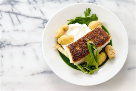 Seared Chilean Sea Bass Recipe With Potatoes And Herb Sauce