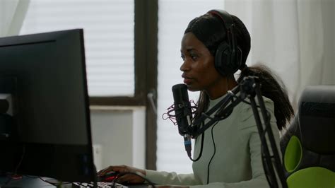 sad black woman streamer  headphone stock footage sbv  storyblocks