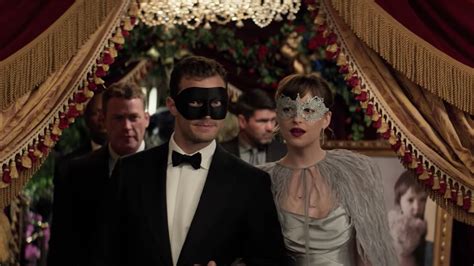 fifty shades darker trailer features masquerade balls and