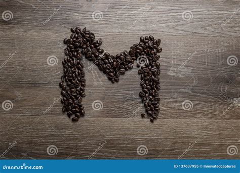 coffee beans arranged   letter  stock image image  design