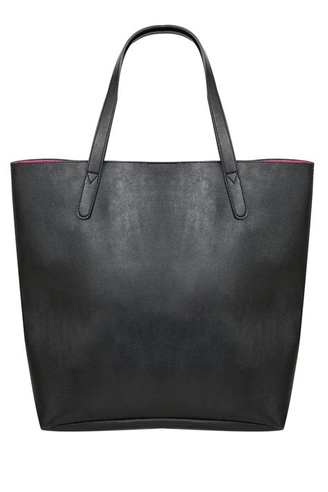 black shopper bag with bright pink lining and eyelet details