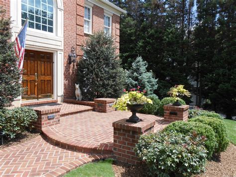 brick herringbone front entrance  posts  walkway traditional