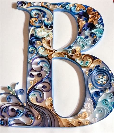 quilled letter  monogram blue scrolls quilled letters paper