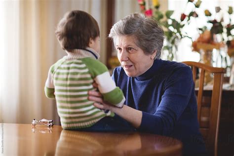 Grandmother Talking To Her Grandson By Nasos Zovoilis Grandmother