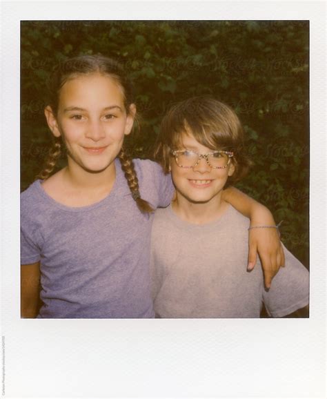 Instant Film Photo Of A Big Sister And Her Little Brother They Re