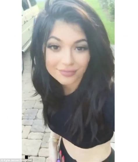 monews kylie jenner proudly displays midriff in emerald two piece number after slamming