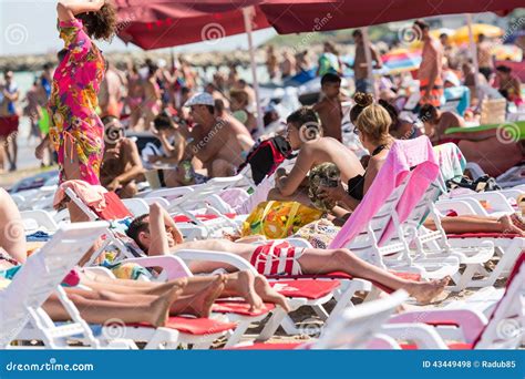 people  sun tanning   black sea beach editorial stock photo image