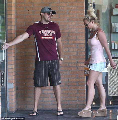britney spears displays her muscular legs in tiny denim shorts on leisurely day out with
