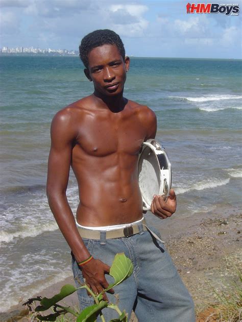 Skinny Black Gay Model On The Beach For A Striptease And