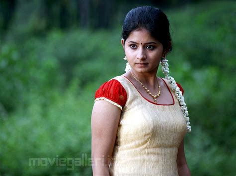 Actress Reshmi Menon Stills In Pavadai Chattai Dress