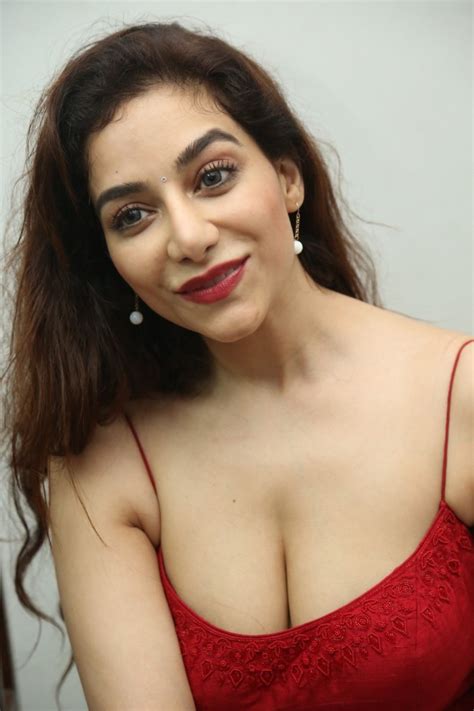 Actress Surabhi Spicy Hot Stills In Red Dress New Movie