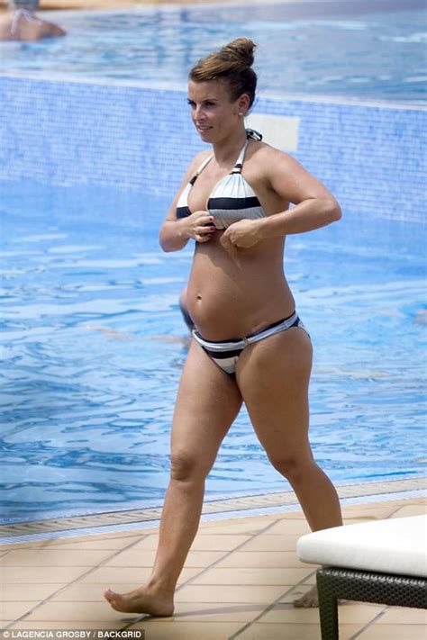 pregnant coleen rooney bronzes her bump in striped bikini daily mail online
