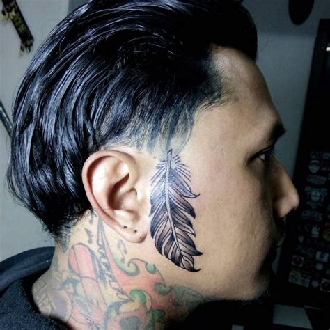 50 Feather Tattoo Designs For Men Rich History And Diverse Meanings