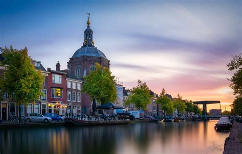 wallpaper sunset  city river building home boats church channel netherlands holland