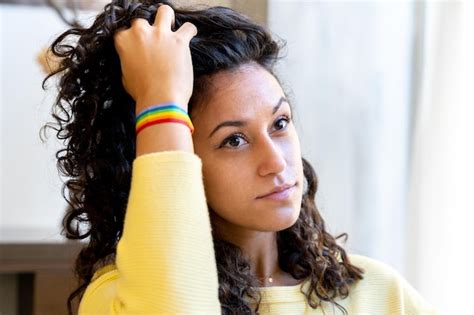 Premium Photo Sensual Woman With A Rainbow Lgbt Bracelet In A Salon