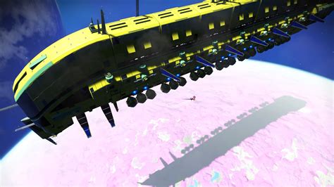 showing off my super massive freighter orbiting a moon [no man s sky