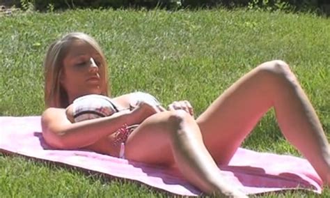 hotty stop nikki sims nude sunbathing