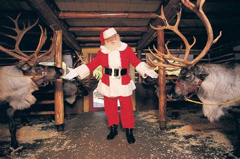 North Pole Santa Feeding The Reindeer Christmas Travel In Search Of