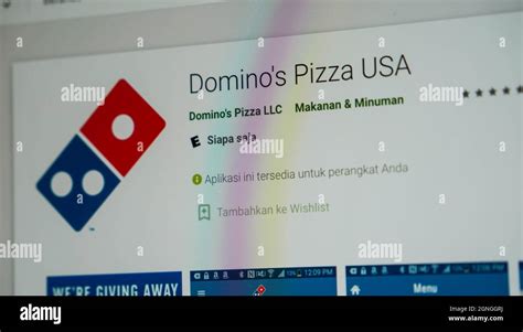 jakarta indonesia september   dominos pizza usa mobile apps website   screen