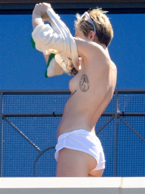 naked miley cyrus in topless on a hotel balcony in sydney