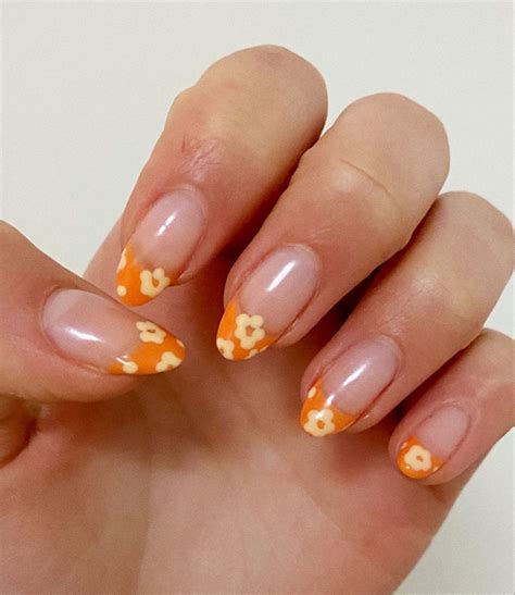 flower french tip nails   french tip nails orange acrylic