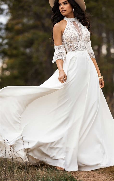 simple bohemian wedding dress with removable arm cuffs all who wander