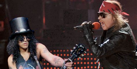 axl rose on guns n roses slash and duff will be around for quite a while consequence of sound