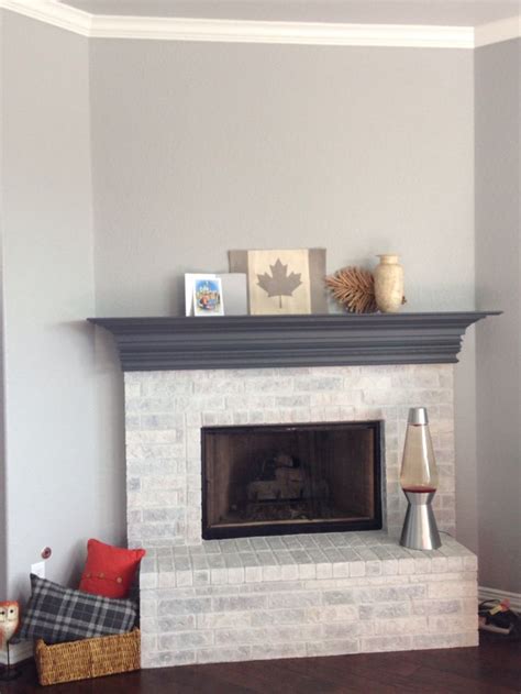 whitewashed fireplace  grey paint mantle painted mantle home