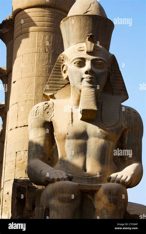 colossal seated statue  ramses ii luxor temple luxor egypt stock