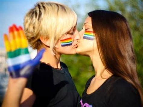 facebook suspends italian woman s account after she posts image of two women kissing in support