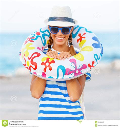 Beach Woman Happy And Colorful Wearing Sunglasses And