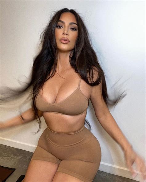 kim kardashian shows off her curves in new skims butter collection bra