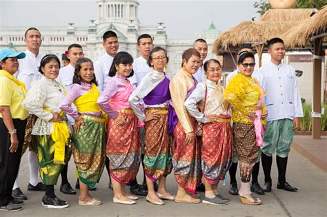 thai people wearing beautiful national dress traditional style cloth in