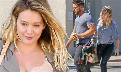 hilary duff shows off toned physique in black leggings at beau jason