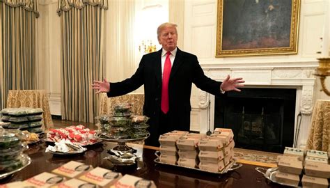 president donald trump serves football team mcdonalds burgers  white house newshub