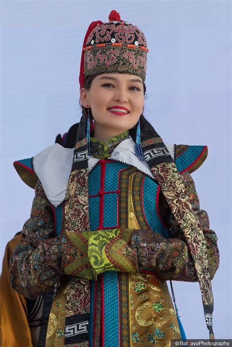 mongolia culture naadam festival  mongolian woman wears traditional headgear