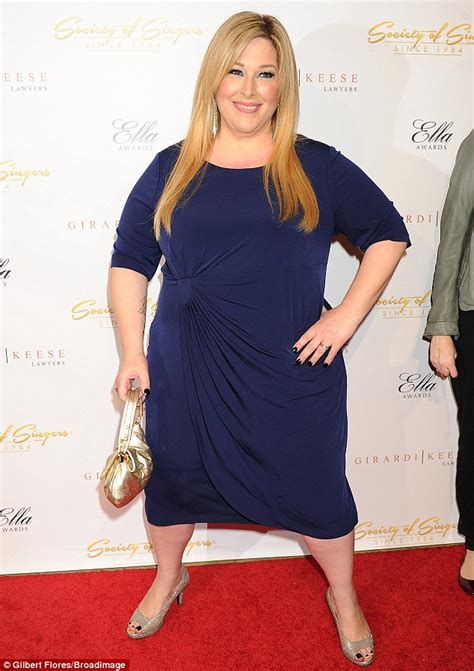 carnie wilson is in a playful mood as she makes glamorous