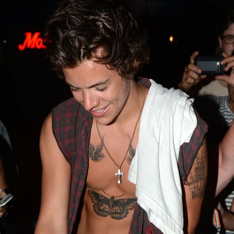 Harry Styles Goes Shirtless Displays Toned Abs And Tattoos—see The Pic