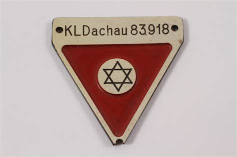 commemorative red triangle dachau badge 83918 with a star of david