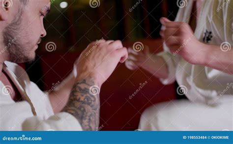 Karate Fighters In Kimonos Fight In Light Spacious Gym Stock Footage