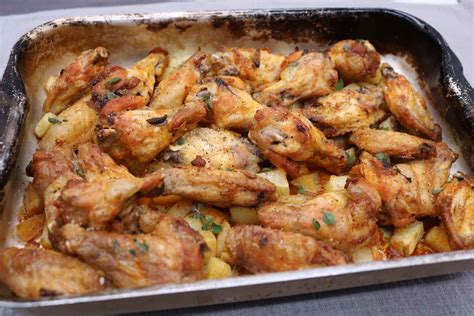 roasted chicken wings  roast potatoes oregano  garlic felly bull