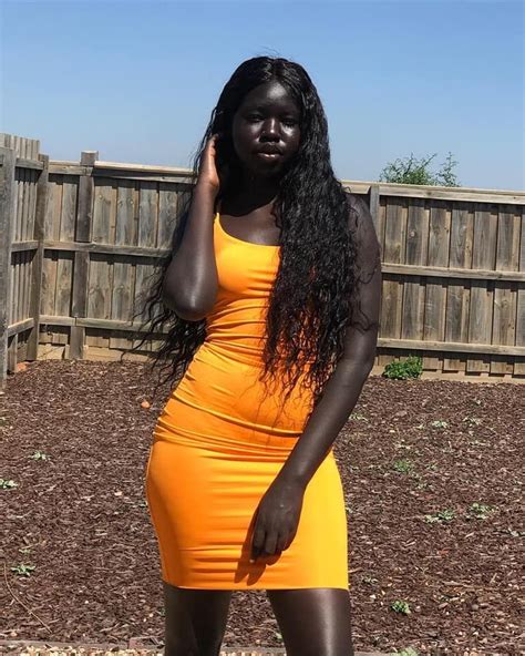 Beautiful Melanated Beauty In Orange Dress