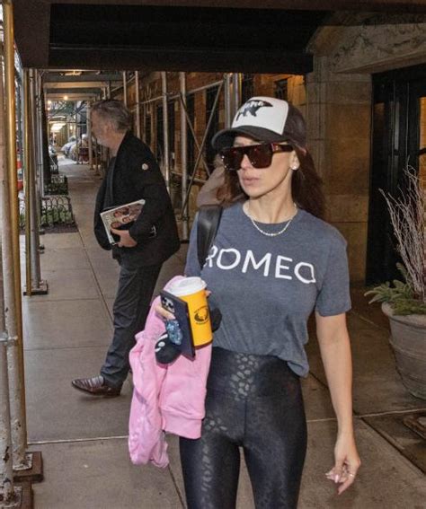 hilaria baldwin protects a photographer from her beleaguered husband