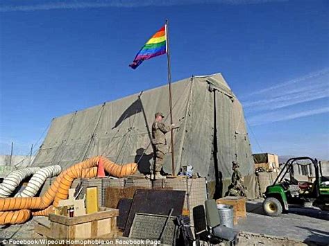 u s military investigating photograph of soldier raising gay pride