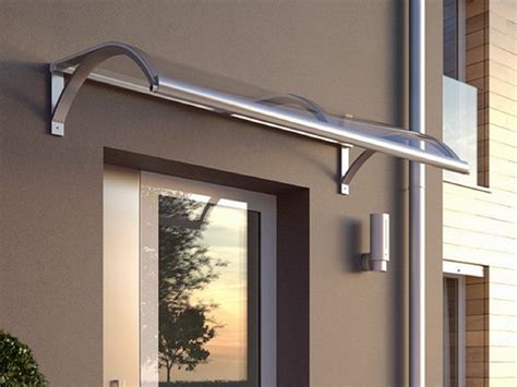 Le nostre pensiline in vetro sono realizzate interamente in acciaio inox e vetro stratificato da 8 o 10 mm. vendita pensiline per esterni-Brescia,Bergamo,Milano,Verona